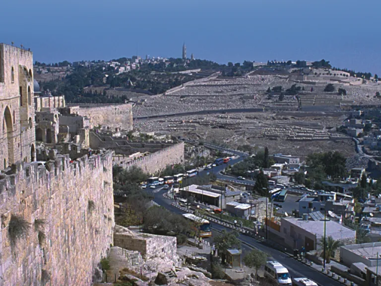 The prophet Zechariah describes how Jesus will return to the Mount of Olives (background, above), which overlooks Jerusalem (foreground) on the city’s east side.