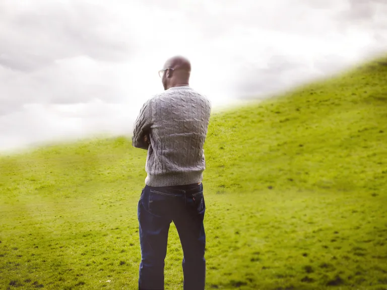 Man standing in a field.