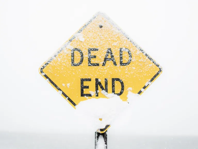 A sign that reads dead end