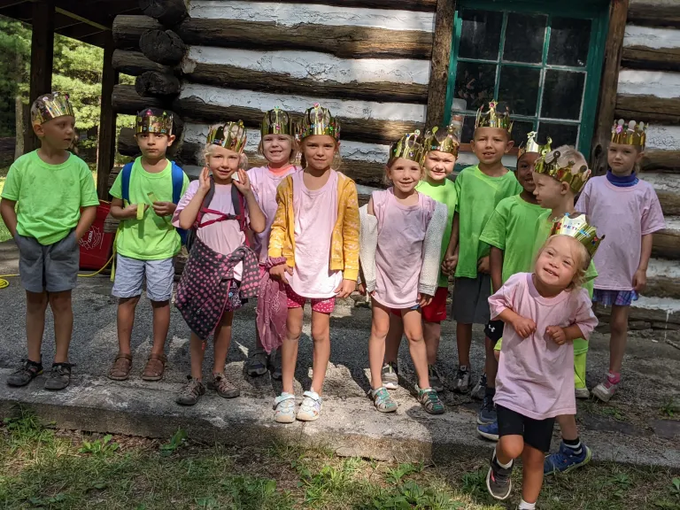 a group of children wearing crowns