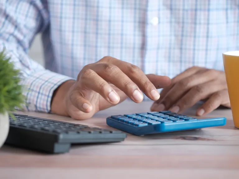a man using a calculator