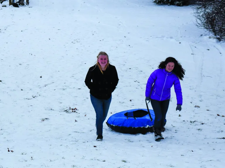 After a few inches of snowfall, campers and staff were able to go tubing and enjoy fellowship outside.