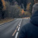 A man looking at a road.