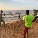 men pulling a fishing net
