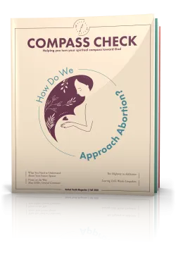 tilted cover of compass check magazine fall 2022